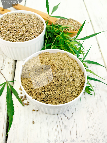 Image of Flour hemp and grain in bowls on board