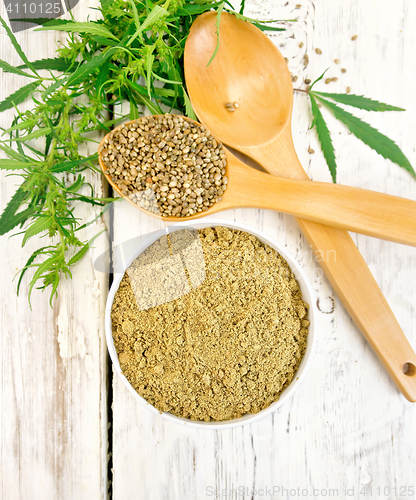 Image of Flour hemp in bowl with spoons on light board top