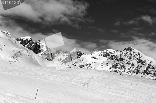 Image of Black and white ski slope at sun winter day