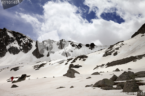 Image of Snow mountain and blue sky with clouds at spring day