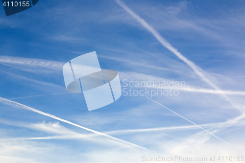 Image of Blue Sky Contrail Clouds Background