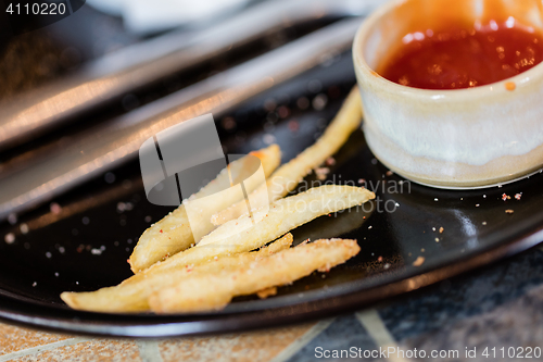 Image of French fries, leftover from a lunch