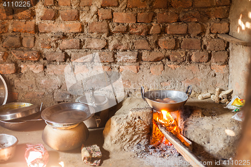 Image of Eggs cooking in Nepali kitchen