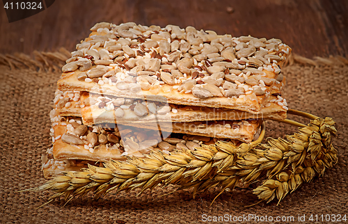 Image of Cookies with cereals and wheat ears on sacking