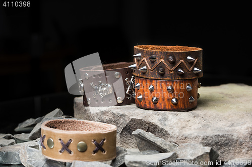 Image of bracelets with spikes and skulls