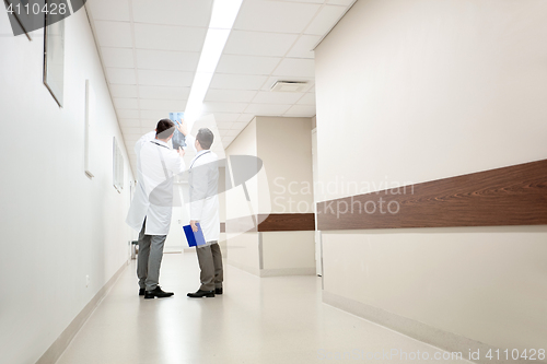 Image of medics with spine x-ray scan at hospital