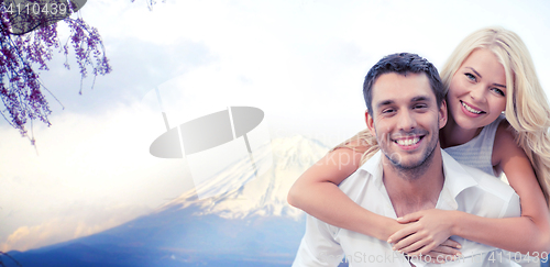 Image of couple having fun  over fuji mountain in japan