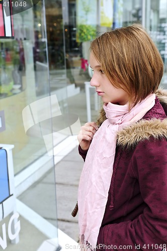 Image of Teenage girl shopping