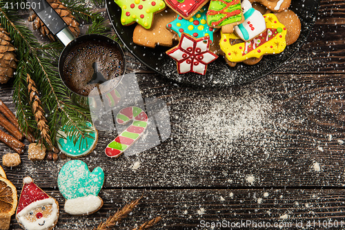 Image of Gingerbreads and coffee for new years or christmas