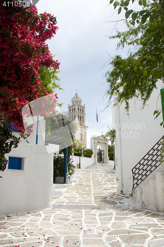 Image of Lefkes Paros Greek Island scene with Agia Triada church and typi