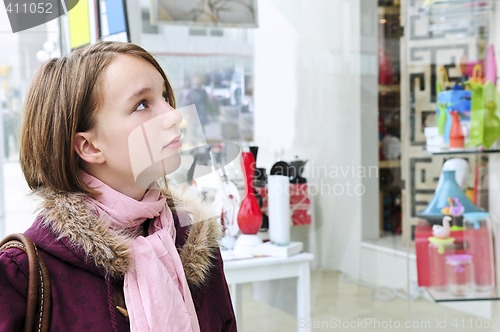 Image of Teenage girl shopping