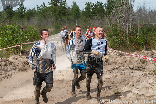 Image of Team runs between stages in extrim race.Tyumen