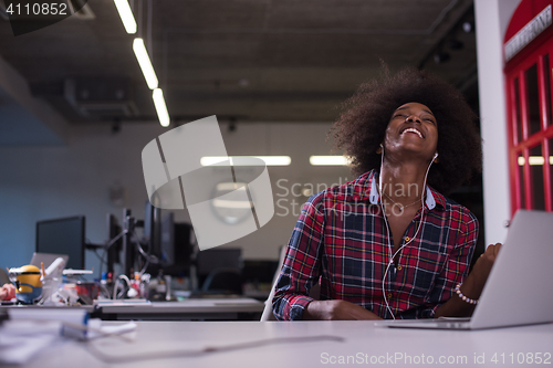 Image of portrait of a young successful African-American woman in modern 