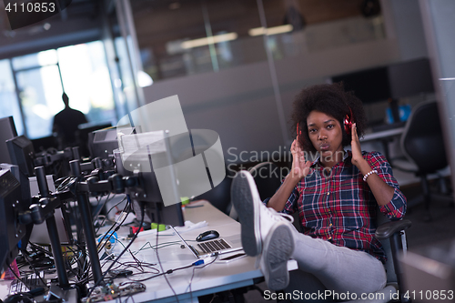 Image of portrait of a young successful African-American woman in modern 