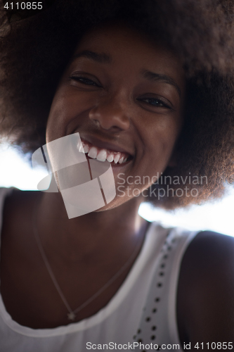 Image of Close up portrait of a beautiful young african american woman sm