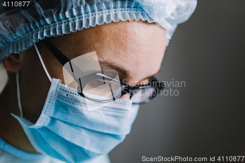 Image of Close up view of scientist in mask