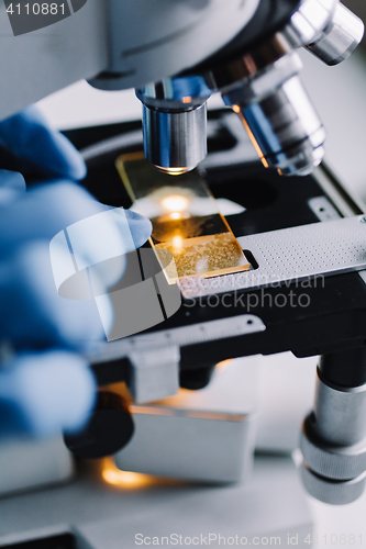 Image of Close up view of glass under microscope