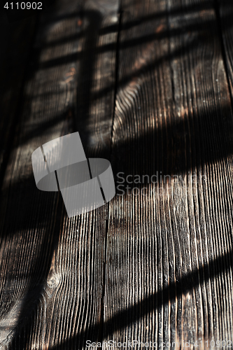 Image of Hardwood floor with shadows