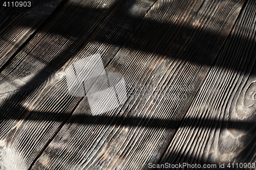 Image of Hardwood floor with shadows