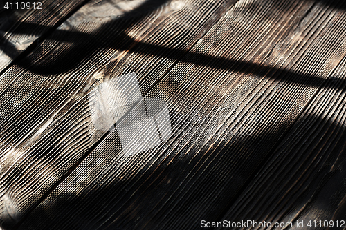 Image of Hardwood floor with shadows