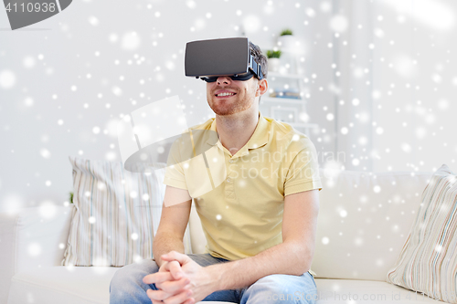 Image of young man in virtual reality headset or 3d glasses