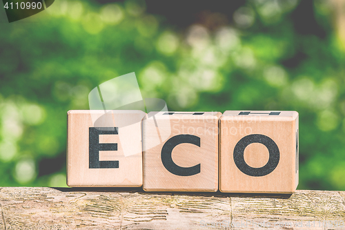 Image of Eco sign made of wooden cubes