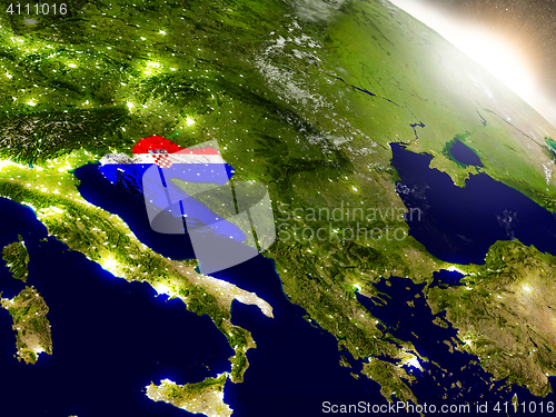 Image of Croatia with flag in rising sun