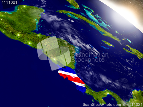 Image of Costa Rica with flag in rising sun