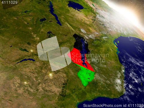 Image of Malawi with flag in rising sun