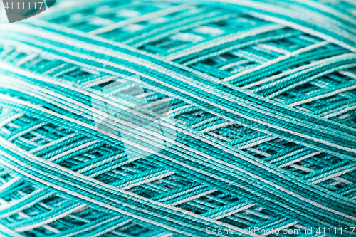 Image of close up of turquoise knitting yarn ball