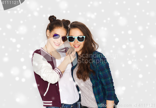 Image of happy smiling pretty teenage girls in sunglasses