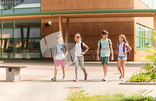 Image of group of happy elementary school students walking