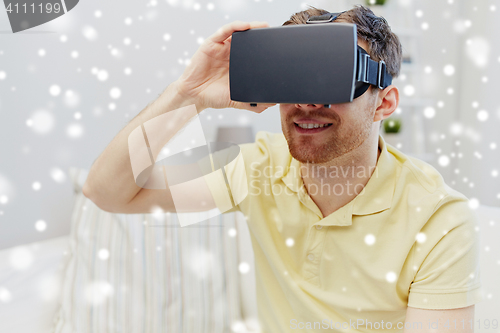 Image of young man in virtual reality headset or 3d glasses