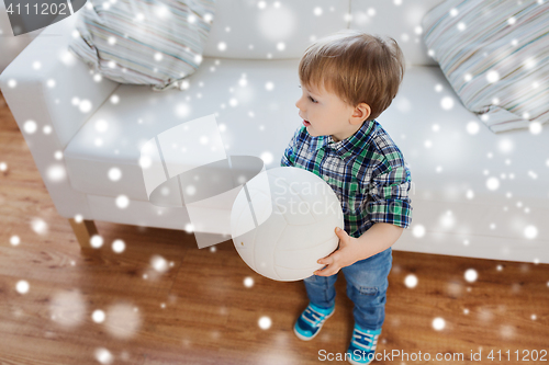 Image of happy little baby boy with ball at home