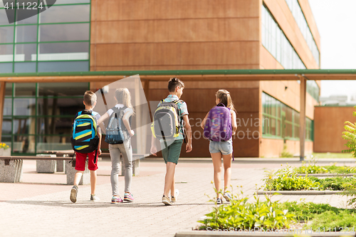 Image of group of happy elementary school students walking