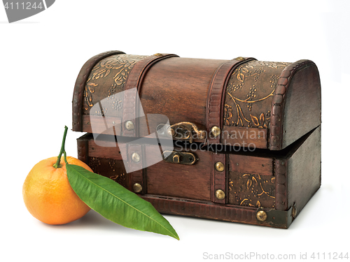 Image of chest and mandarin