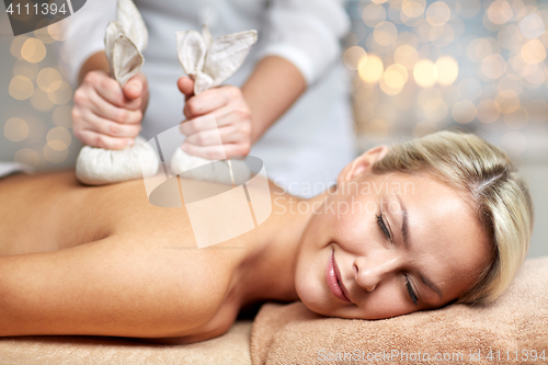 Image of close up of woman lying on massage table in spa