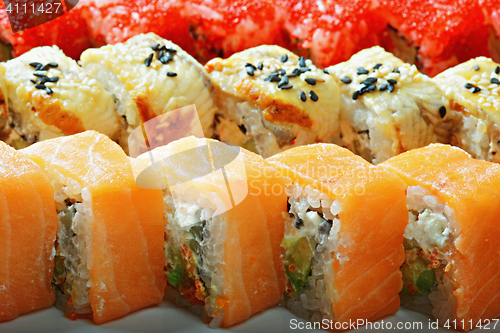 Image of Different sushi rolls closeup