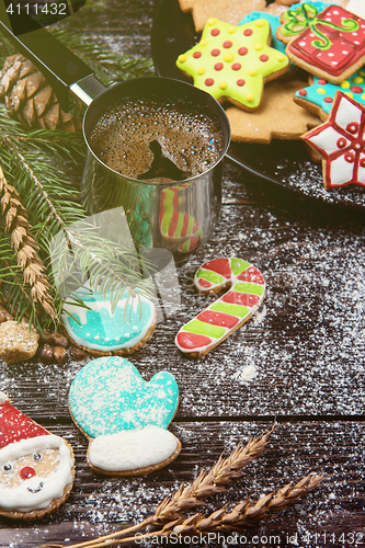 Image of Gingerbreads and coffee for new years or christmas