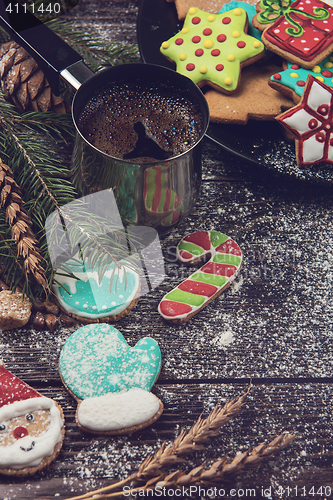 Image of Gingerbreads and coffee for new years or christmas