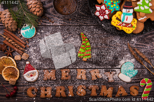 Image of Gingerbreads and coffee for new years or christmas