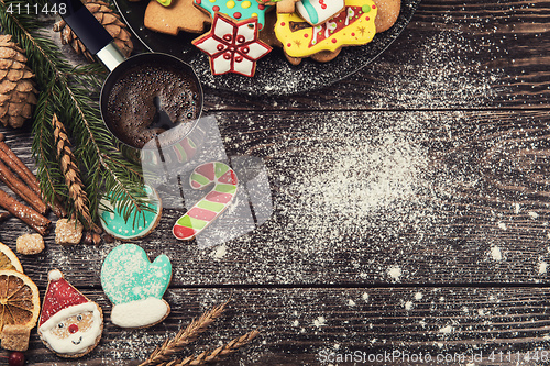 Image of Gingerbreads and coffee for new years or christmas