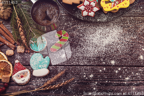 Image of Gingerbreads and coffee for new years or christmas