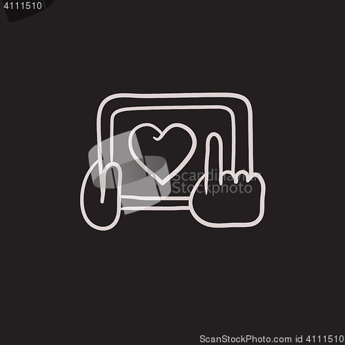 Image of Hands holding tablet with heart sign sketch icon.