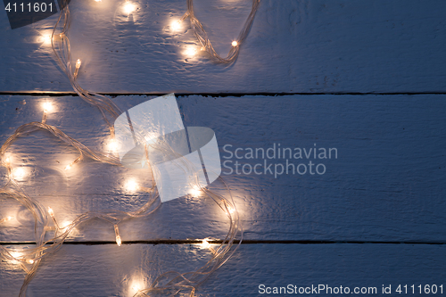 Image of Garland on empty wooden floor