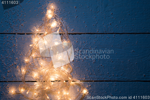 Image of Christmas card with luminous festoon