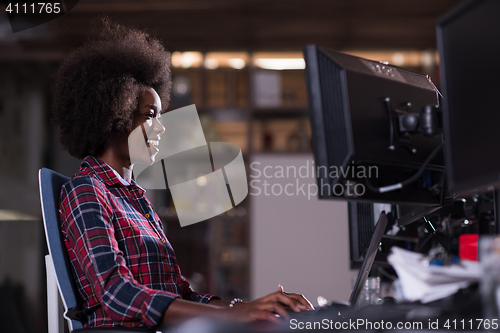 Image of portrait of a young successful African-American woman in modern 