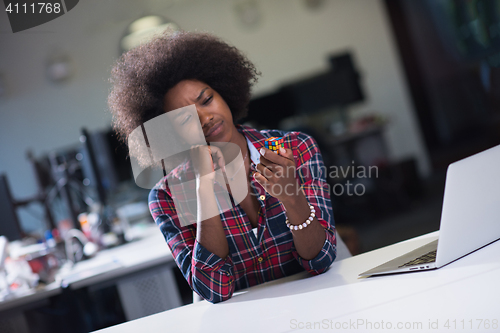 Image of portrait of a young successful African-American woman in modern 