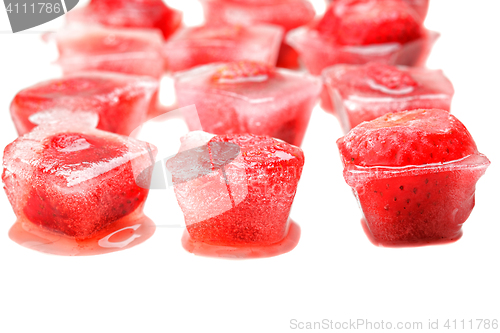 Image of Three rows of strawberries in ice