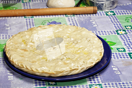 Image of Closed meat pie on plate